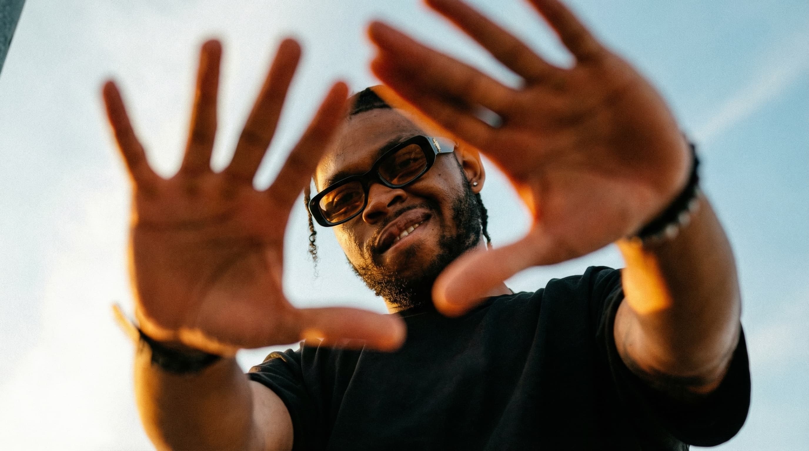 Man smiling confidently, full of energy and vitality