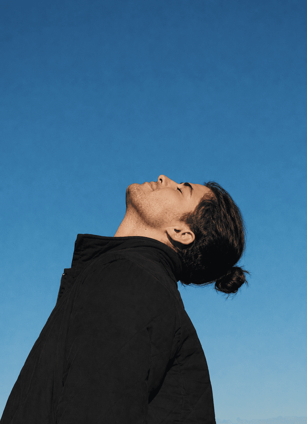 Man outdoors in profile
