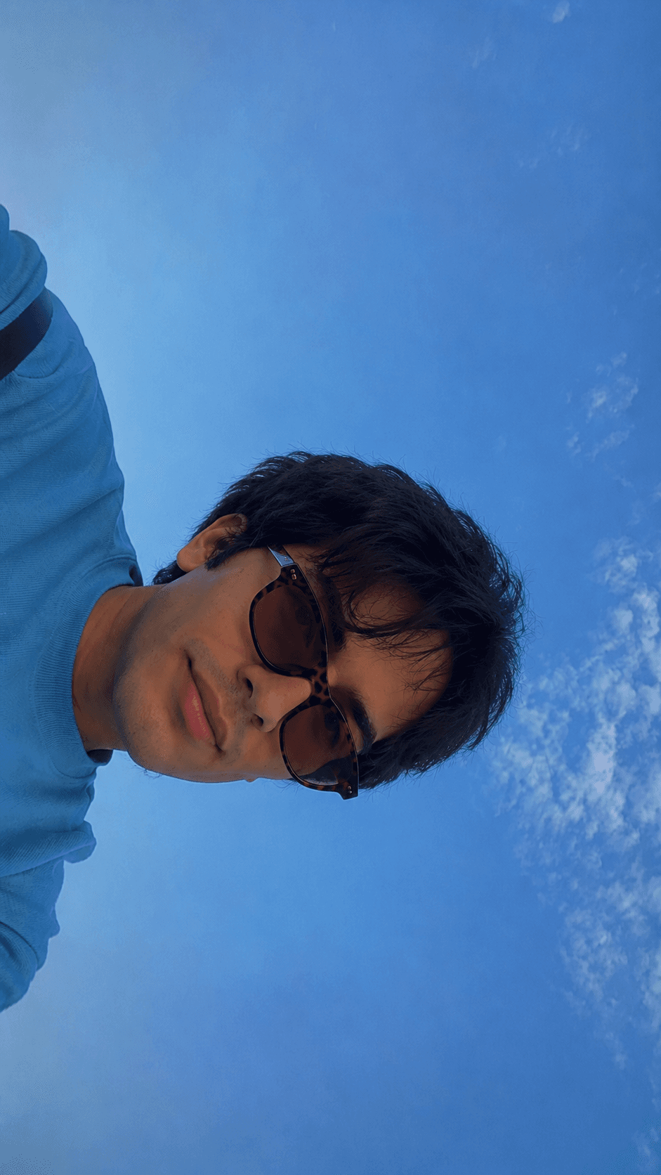 Man outdoors wearing sunglasses