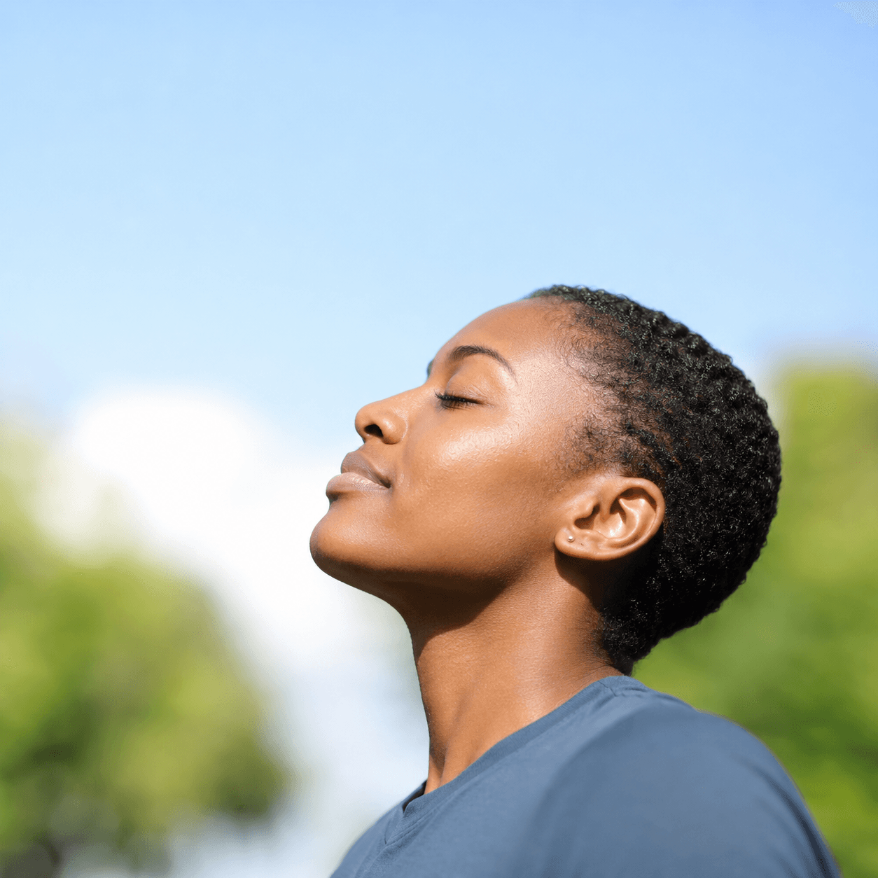 Woman outdoors in profile
